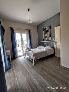 Cama o camas de una habitación en Parga Horizon Apartments