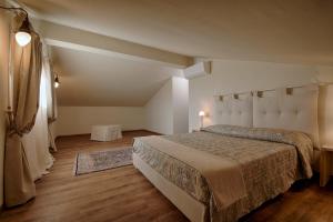 Postel nebo postele na pokoji v ubytování Agriturismo Poderedodici + 37 fotografií