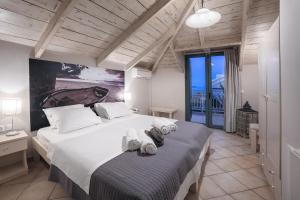 Voodi või voodid majutusasutuse Pierros Hotel toas