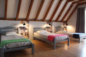 Postel nebo postele na pokoji v ubytování Hotel La Peyrade