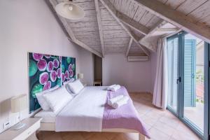 Voodi või voodid majutusasutuse Pierros Hotel toas