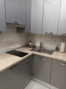 Η κουζίνα ή μικρή κουζίνα στο RynOK 25 Elite Lviv Center