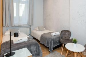 Posteľ alebo postele v izbe v ubytovaní Rainbow Apartments 3