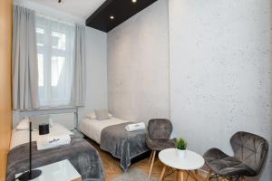 Posteľ alebo postele v izbe v ubytovaní Rainbow Apartments 3