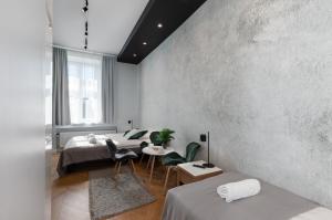 Posteľ alebo postele v izbe v ubytovaní Rainbow Apartments 3