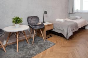Posteľ alebo postele v izbe v ubytovaní Rainbow Apartments 3