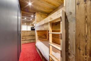 Ένα ή περισσότερα κρεβάτια σε δωμάτιο στο Appartement d'exception Tignes