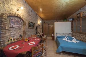 Letto o letti in una camera di Menecrates Rustic - San Matteo