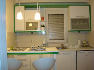 A kitchen or kitchenette at Apartments Nela