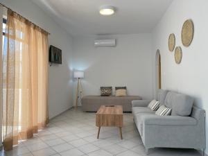 Кът за сядане в Elounda Canali 2 Apts