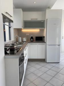 Kuchyň nebo kuchyňský kout v ubytování Elounda Canali 2 Apts