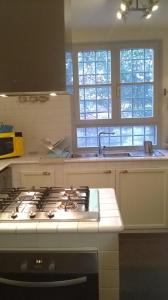 A kitchen or kitchenette at Casa Costanza