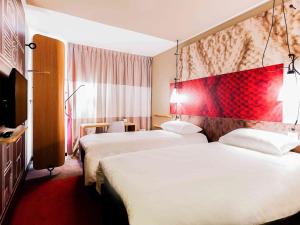 Posteľ alebo postele v izbe v ubytovaní Ibis Gdansk Stare Miasto
