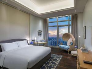 Voodi või voodid majutusasutuse Sofitel Foshan Shunde toas
