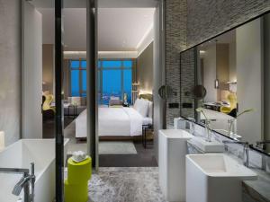Voodi või voodid majutusasutuse Sofitel Foshan Shunde toas