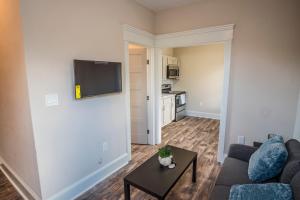 a living room with a couch and a table at Beautiful Guest House on New Built Home Near Downtown in San Antonio