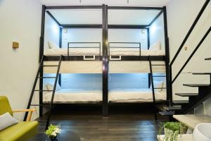 Postel nebo postele na pokoji v ubytování Place‧X Hotel