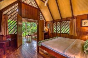 Voodi või voodid majutusasutuse Shawandha Lodge toas