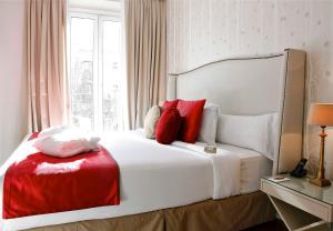 Ένα ή περισσότερα κρεβάτια σε δωμάτιο στο Boutike Cibeles