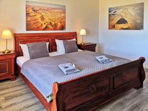 Ένα ή περισσότερα κρεβάτια σε δωμάτιο στο Landlust Hotel
