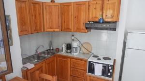 Kuchyň nebo kuchyňský kout v ubytování Stella Rooms