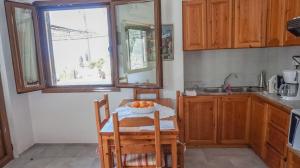 Kuchyň nebo kuchyňský kout v ubytování Stella Rooms