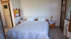 Postel nebo postele na pokoji v ubytování Stella Rooms