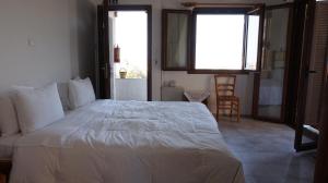 Postel nebo postele na pokoji v ubytování Stella Rooms