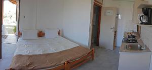 Kuchyň nebo kuchyňský kout v ubytování Stella Rooms