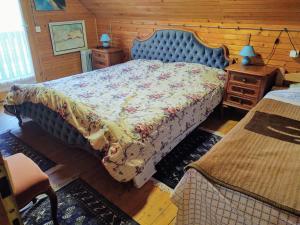 Posteľ alebo postele v izbe v ubytovaní Dedinski Raj