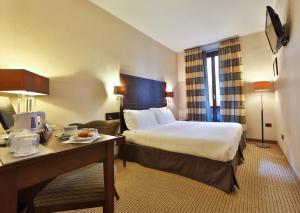TV a/nebo společenská místnost v ubytování Best Western Hotel Piemontese