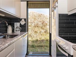 Kuchyň nebo kuchyňský kout v ubytování Seaside Escape with Views - By Traum Ferienwohnungen + 19 fotografií