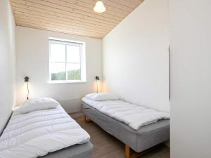 Postel nebo postele na pokoji v ubytování Apartment Faaborg III