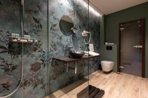 Kúpeľňa v ubytovaní Darovanský Dvůr - Wellness & Golf Hotel