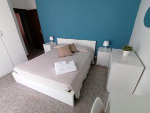 Posteľ alebo postele v izbe v ubytovaní Antonella's House