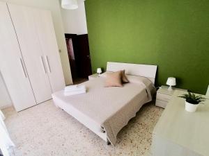 Posteľ alebo postele v izbe v ubytovaní Antonella's House