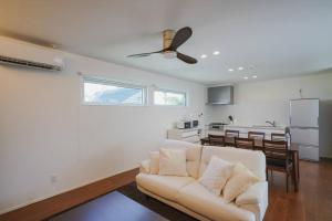 Kuchyň nebo kuchyňský kout v ubytování Villa COLORS〜Ocean〜