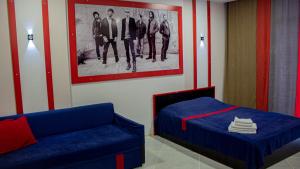 Uma área de estar em Rock Hotel First Line