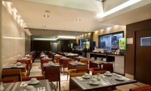 Restaurant o un lloc per menjar a TURIM Luxe Hotel