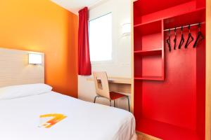 Letto o letti in una camera di Premiere Classe Caen Nord - Mémorial