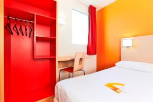 Letto o letti in una camera di Premiere Classe Caen Nord - Mémorial