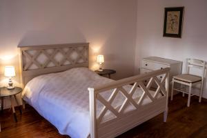 Postel nebo postele na pokoji v ubytování Gîte du Café Suquet Giroussens