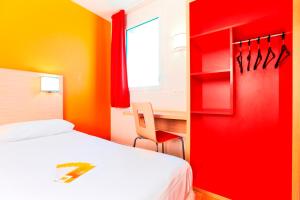 Letto o letti in una camera di Premiere Classe Caen Nord - Mémorial