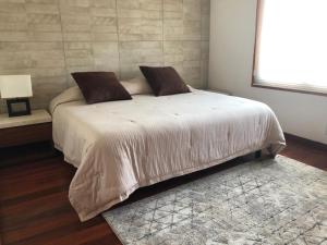 Katil atau katil-katil dalam bilik di Habitaciones con baño privado disponibles