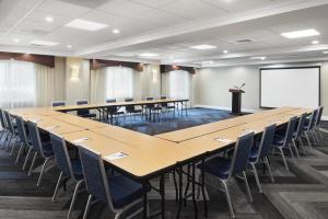 a large conference room with a long table and chairs at Holiday Inn Express & Suites - Spartanburg-North by IHG in Spartanburg +20 photos