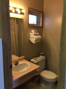 Ein Badezimmer in der Unterkunft Ranchland Villa Motel