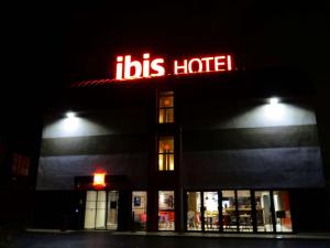 Et logo, certifikat, skilt eller en pris der bliver vist frem på ibis Soissons