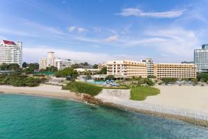an aerial view of a beach and buildings at Dusit Thani Pattaya in North Pattaya