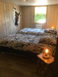 Postel nebo postele na pokoji v ubytování Chalet Le Cactus avec sauna privatif