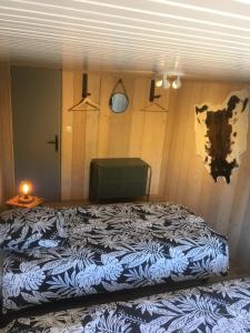 Postel nebo postele na pokoji v ubytování Chalet Le Cactus avec sauna privatif